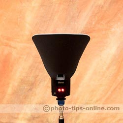 PRESSlite ECLIPSE Light Shield: front view, flash fired, stray light blocked
