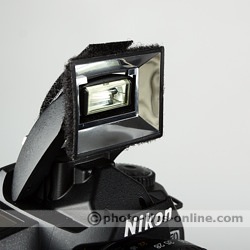Promaster Universal Softbox for built-in flash: mounting base attached to a built-in flash